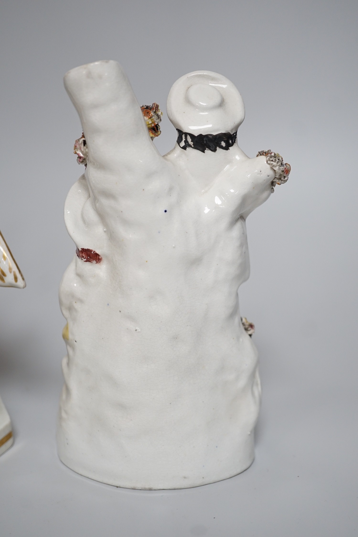 A Worcester milk jug, c.1780, a Newhall-type cream jug, c.1795, a Staffordshire porcelain model of an eagle, c.1830-40, 17cm high, and two Staffordshire porcellaneous models